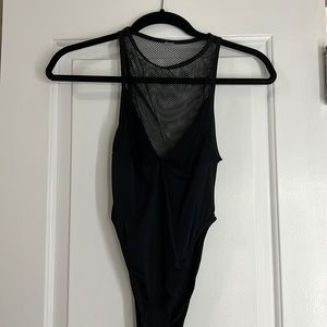 Black mesh body suit